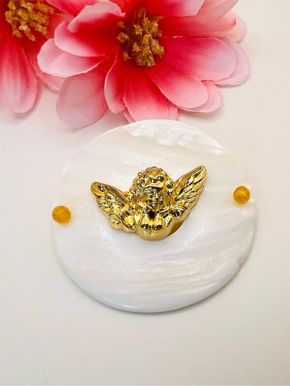 Gold Cherub brooch Accent on White Mother-of-Pearl Disc
